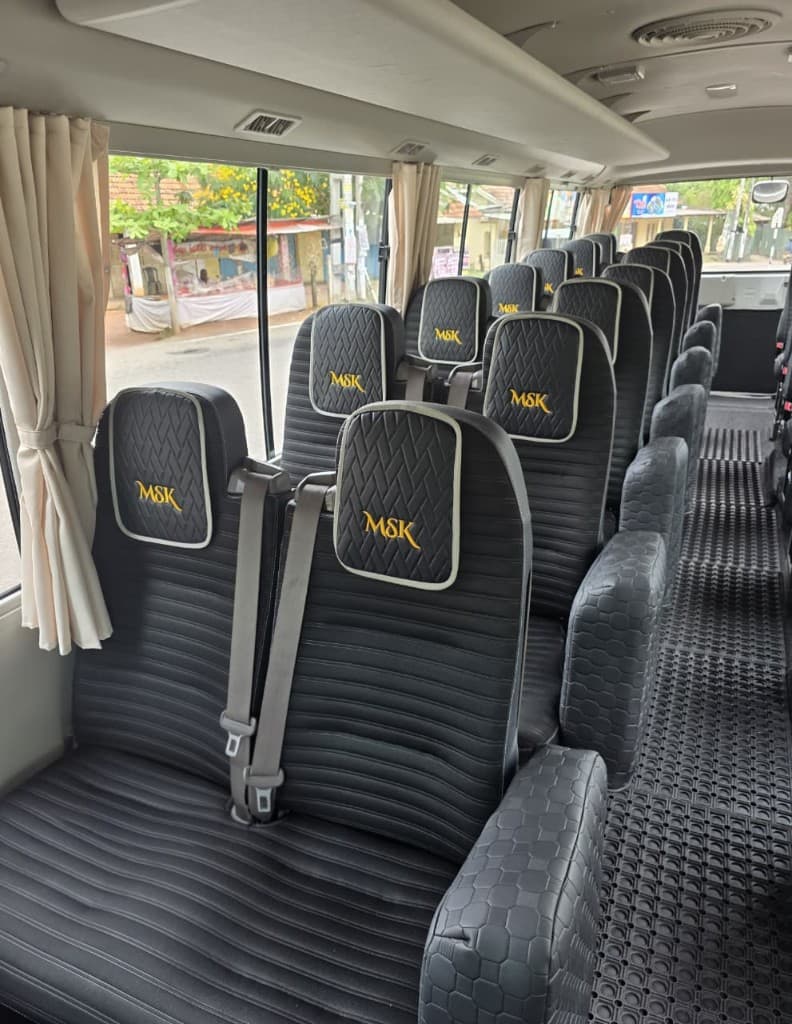 Close-up of comfortable reclining seats with seatbelts